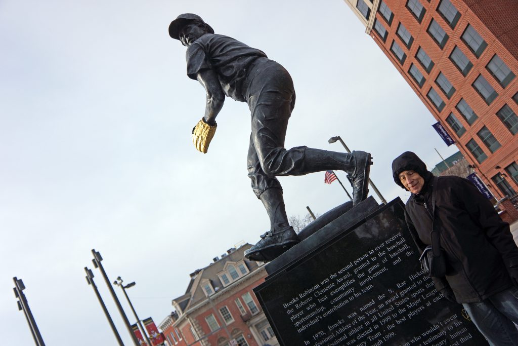 A statue of Brooks Robinson in the Baltimore Inner Harbor area